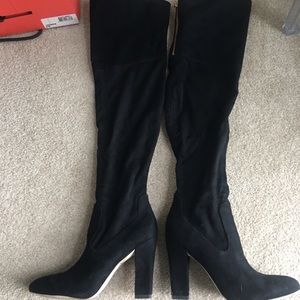 OTK black suede boots with gold zipper detail